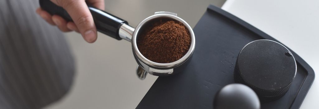 coffee grounds in porta- filter