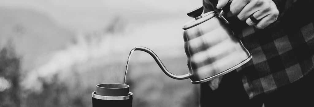 man pouring gooseneck kettle