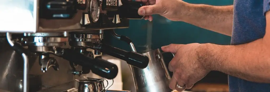 barista steaming milk