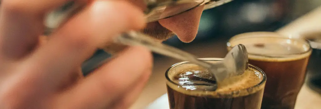 coffee cupping, coffee, specialty coffee, spray coffee beans before grinding